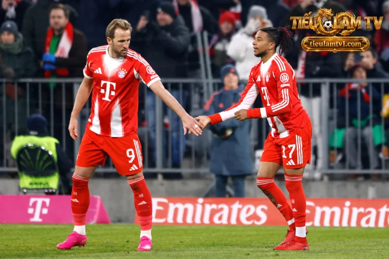 Harry Kane và Michael Olise bắt tay trong trang phục Bayern Munich
